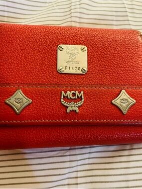 MCM Red Pebbled Leather Continental Wallet with Gold Logo Plaque